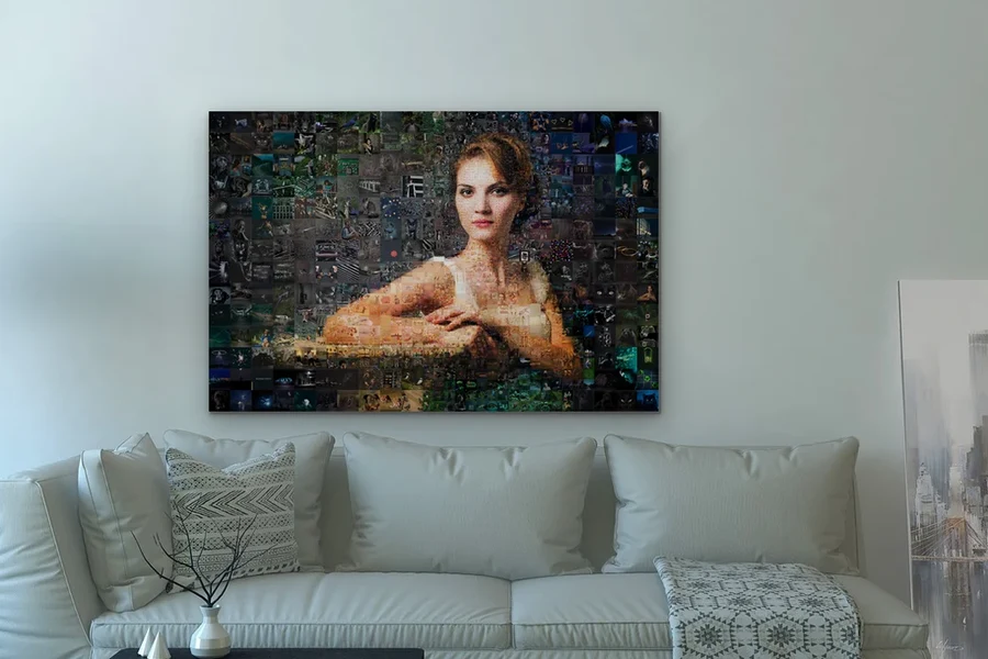 The finished photo mosaic hanging above a sofa